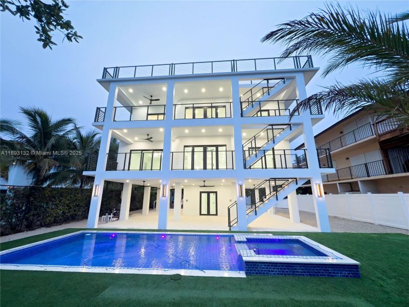 Front exterior of a new home in , Tavernier, FL, highlighting curb appeal (Image 21).