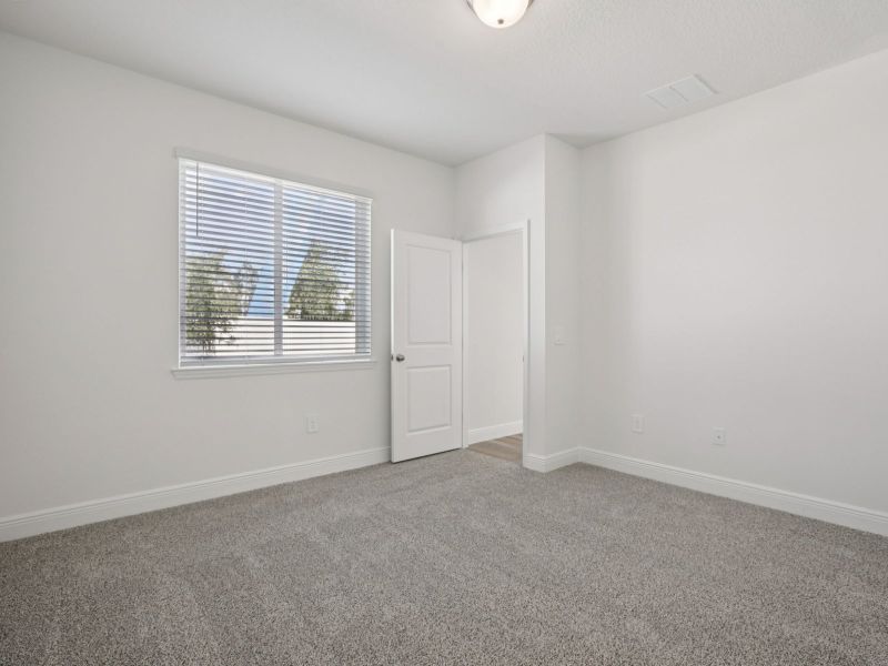 Spacious, unfurnished interior of a new home in Cyrene at Minneola - Villas, Minneola (Image 12). Spacious, unfurnished interior of a new home in Cyrene at Minneola - Villas, Minneola (Image 12).