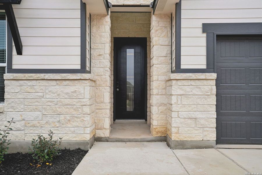 Exterior details and patio area of a home in Estancia Ranch - Classic Series, San Antonio (Image 3).