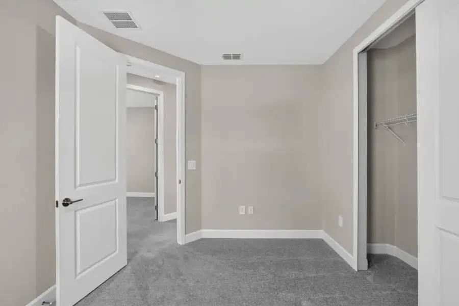 Spacious, unfurnished interior of a new home in Westview Community Group Page, Kissimmee (Image 19).