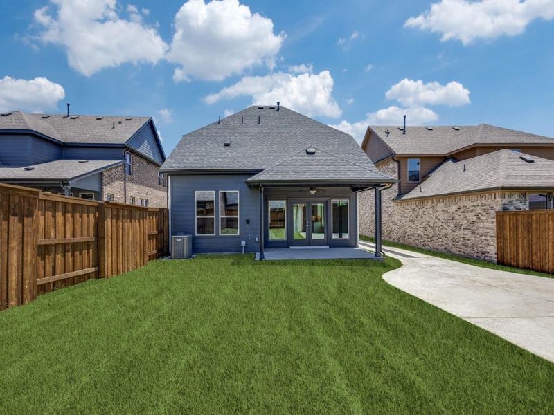 This great covered back patio offers the perfect place to enjoy morning coffee or dining al fresco! This great covered back patio offers the perfect place to enjoy morning coffee or dining al fresco!