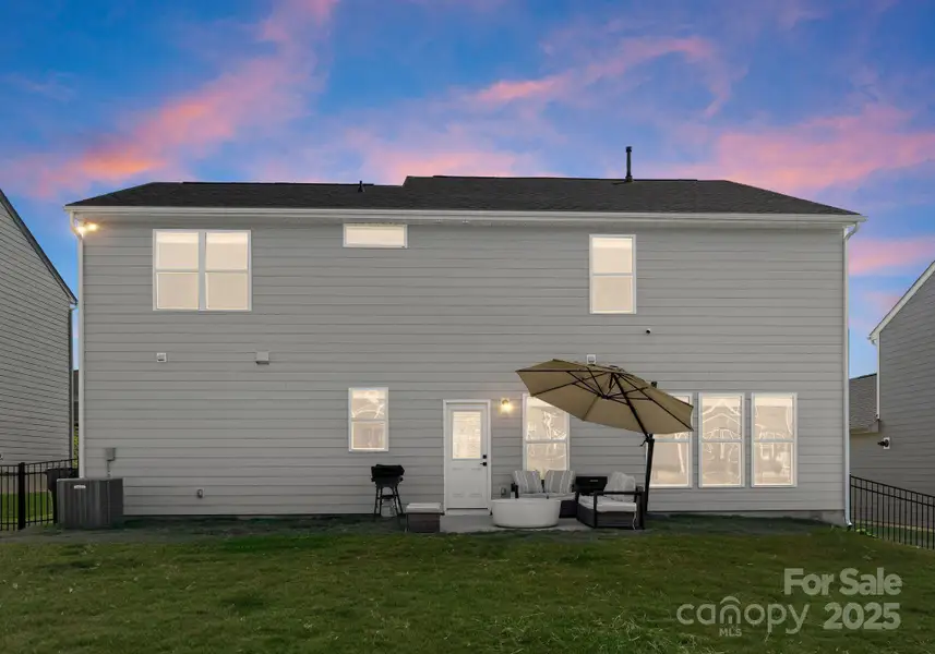 Exterior details and patio area of a home in , Charlotte (Image 3). Exterior details and patio area of a home in , Charlotte (Image 3).