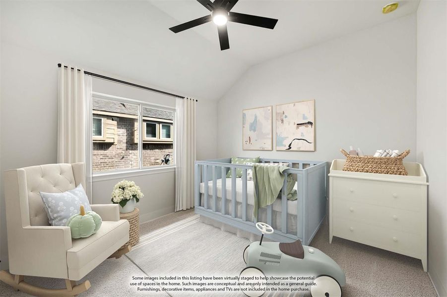 Nursery with blue crib, white dresser, rocking chair, and ceiling fan on vaulted ceiling