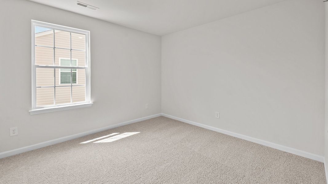 Spacious, unfurnished interior of a new home in Carter Ridge, Greenville (Image 24).