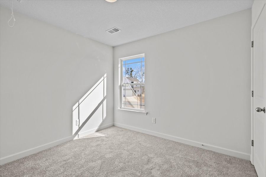 Representative unfurnished interior of a home built from the Roebuck by Enchanted Homes in Las Palomas Country Club Estates, La Vernia (Image 33).