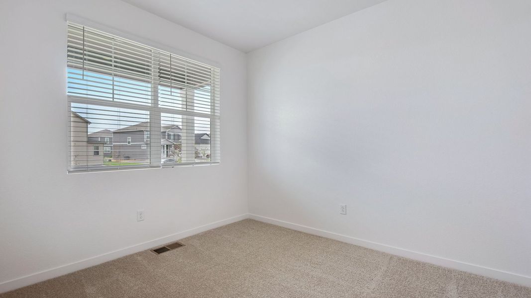 Spacious, unfurnished interior of a new home in Silver Peaks, Lochbuie (Image 14).