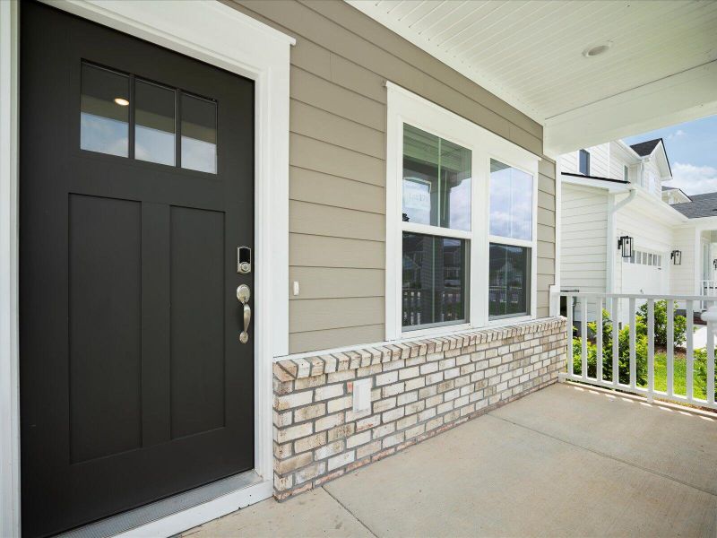 Exterior details and patio area of a home in The Coves at Lakes of Cane Bay, Summerville (Image 2). Exterior details and patio area of a home in The Coves at Lakes of Cane Bay, Summerville (Image 2).