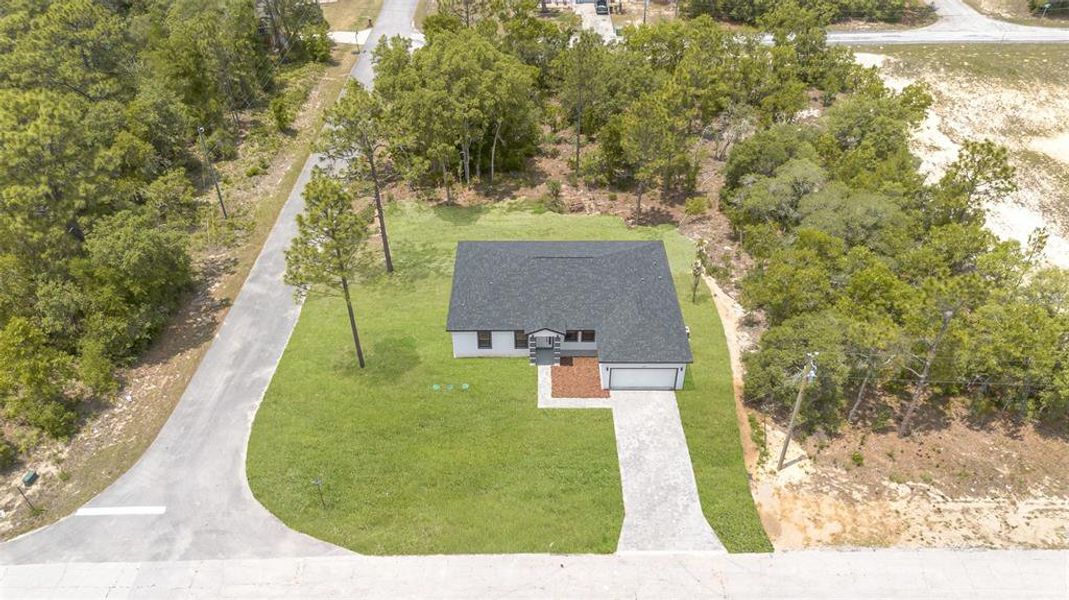 Front exterior of a new home in , Citrus Springs, FL, highlighting curb appeal (Image 22).
