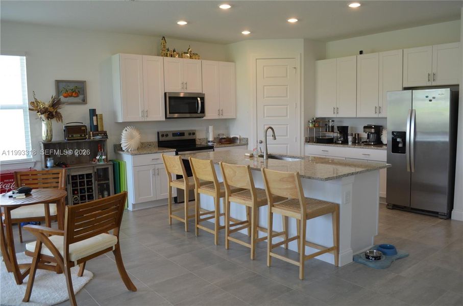 Furnished interior view inside a new home in , Port St. Lucie (Image 7).