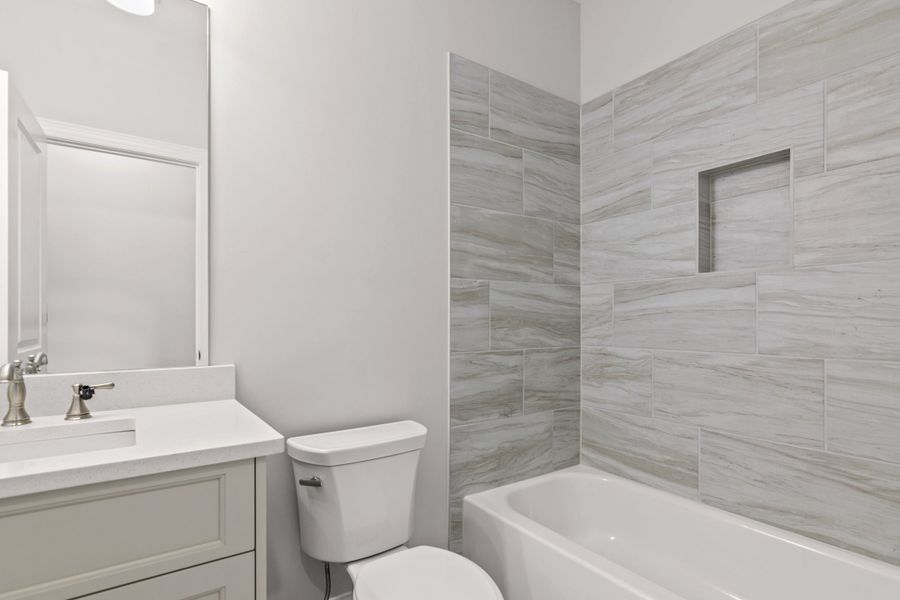 Representative furnished interior of a home built from the The Danville by The Providence Group in Bellwyn, Alpharetta (Image 22).