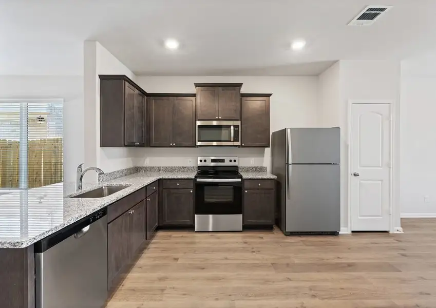 Representative furnished interior of a home built from the Orchid by LGI Homes in Southaven, Hutchins (Image 4).