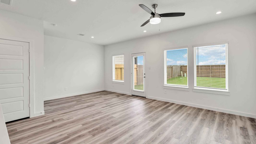 Representative unfurnished interior of a home built from the Hibiscus by D.R. Horton in City Gate North, Houston (Image 8).