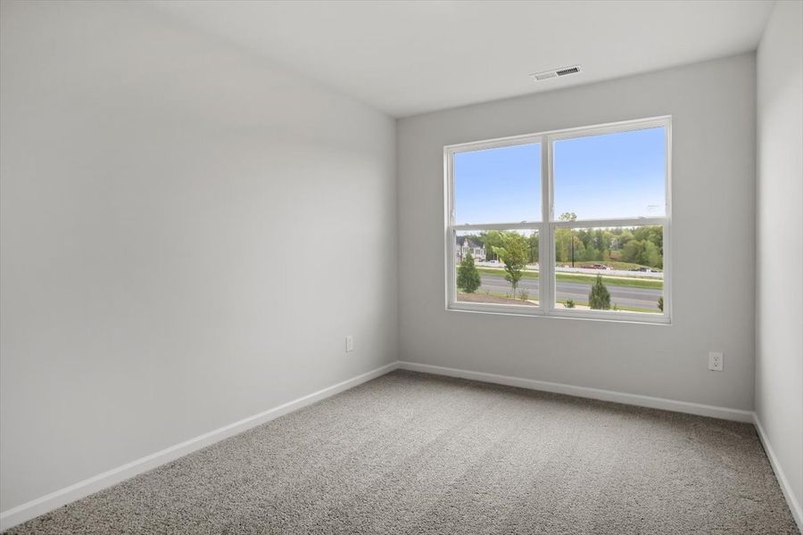 Spacious, unfurnished interior of a new home in Sweetbrier, Durham (Image 24).