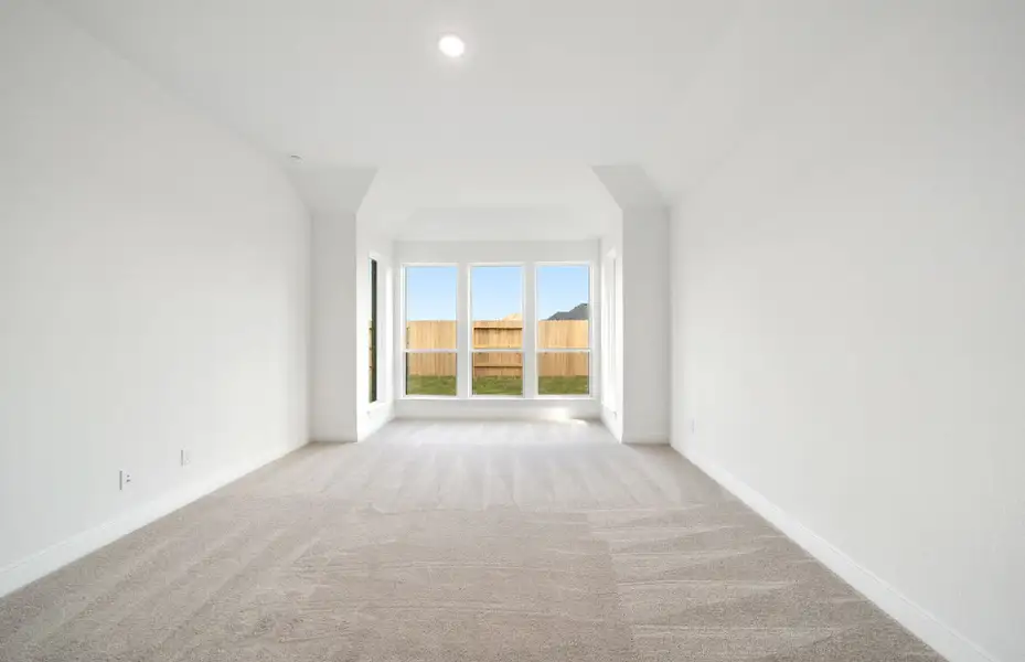 Representative unfurnished interior of a home built from the Chilton by Pulte Homes in Saddleback at Santa Rita Ranch, Liberty Hill (Image 8).