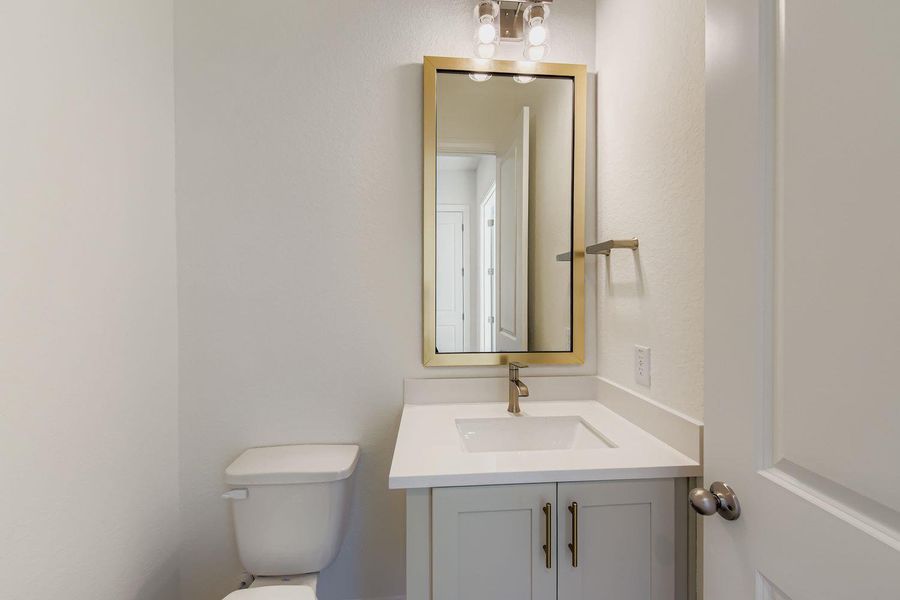 Furnished interior view inside a new home in 6 Creeks, Kyle (Image 7).