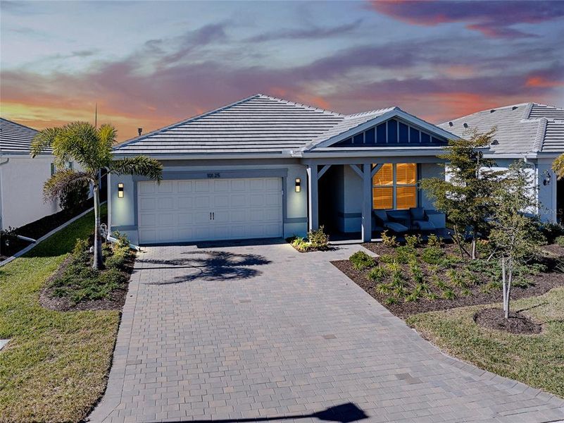 Front exterior of a new home in , Englewood, FL, highlighting curb appeal (Image 26).