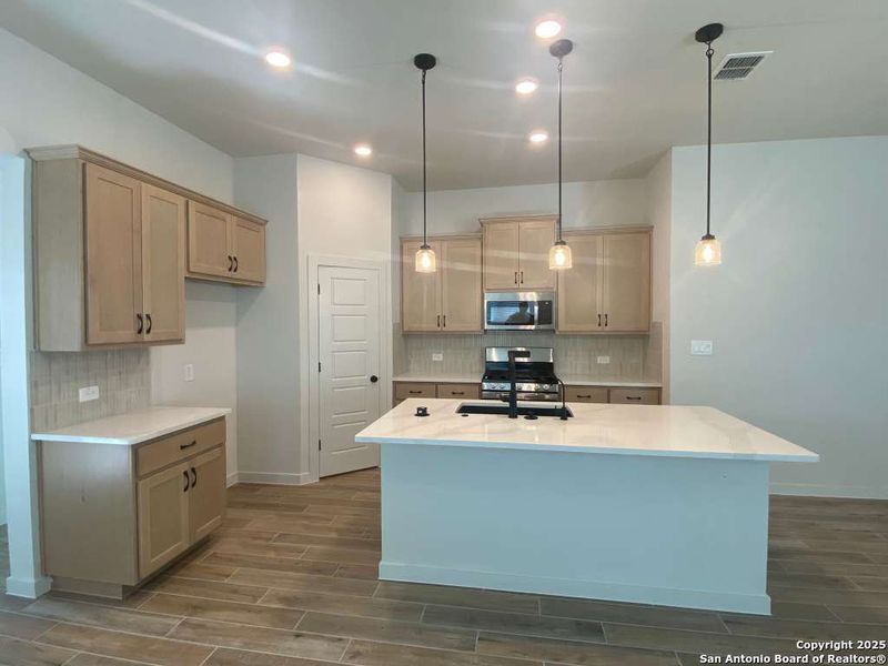 Furnished interior view inside a new home in Stream Waters, Seguin (Image 8).