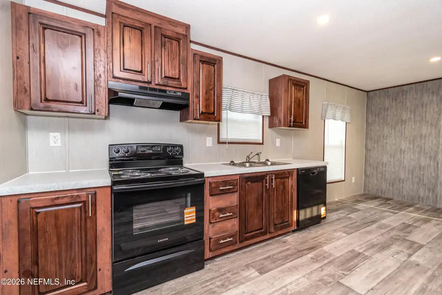 Furnished interior view inside a new home in , Glen St. Mary (Image 4).