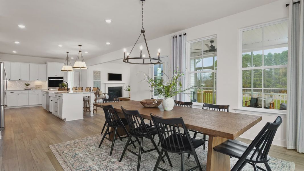 Stonefield home plan large breakfast area connecting to the kitchen and family room Stonefield home plan large breakfast area connecting to the kitchen and family room