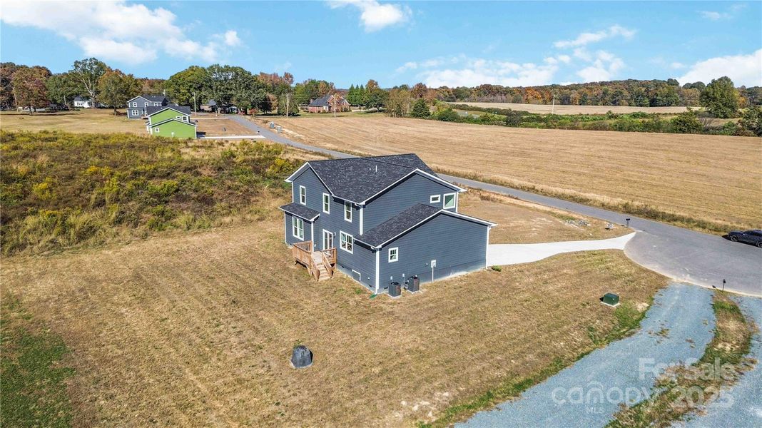 Front exterior of a new home in , Monroe, NC, highlighting curb appeal (Image 21).
