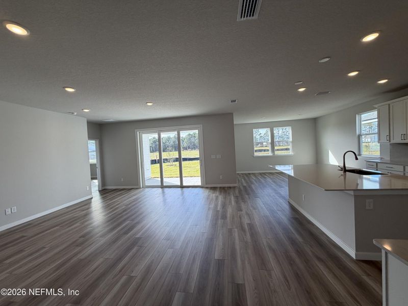 Spacious, unfurnished interior of a new home in The Cypress Series at Reserve East, Flagler Beach (Image 28).