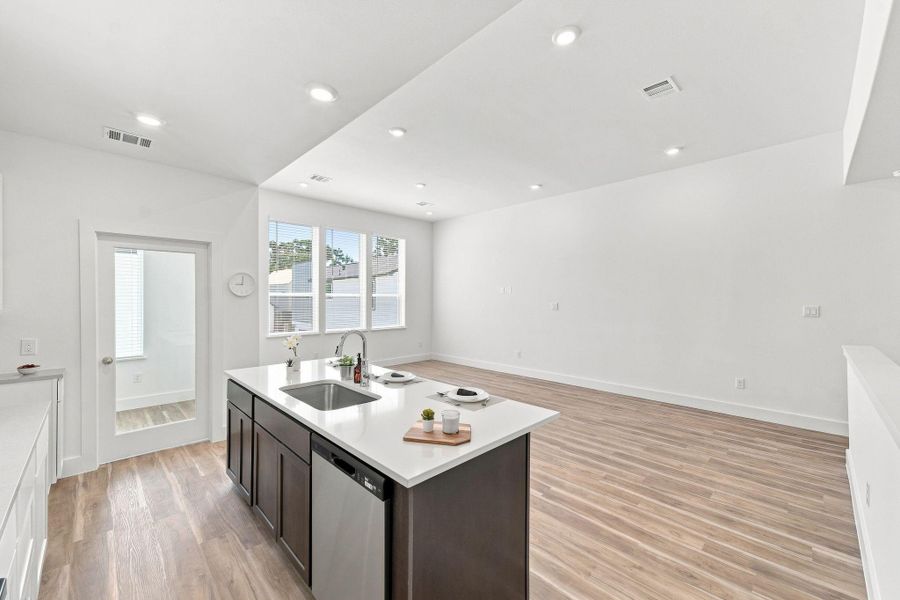 Bright and versatile upstairs living space with an open layout, recessed lighting, and abundant natural light. Bright and versatile upstairs living space with an open layout, recessed lighting, and abundant natural light.