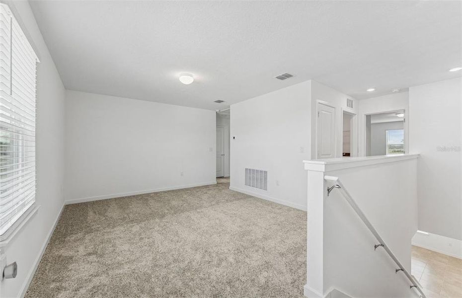 Spacious, unfurnished interior of a new home in Twisted Oaks, Wildwood (Image 17).