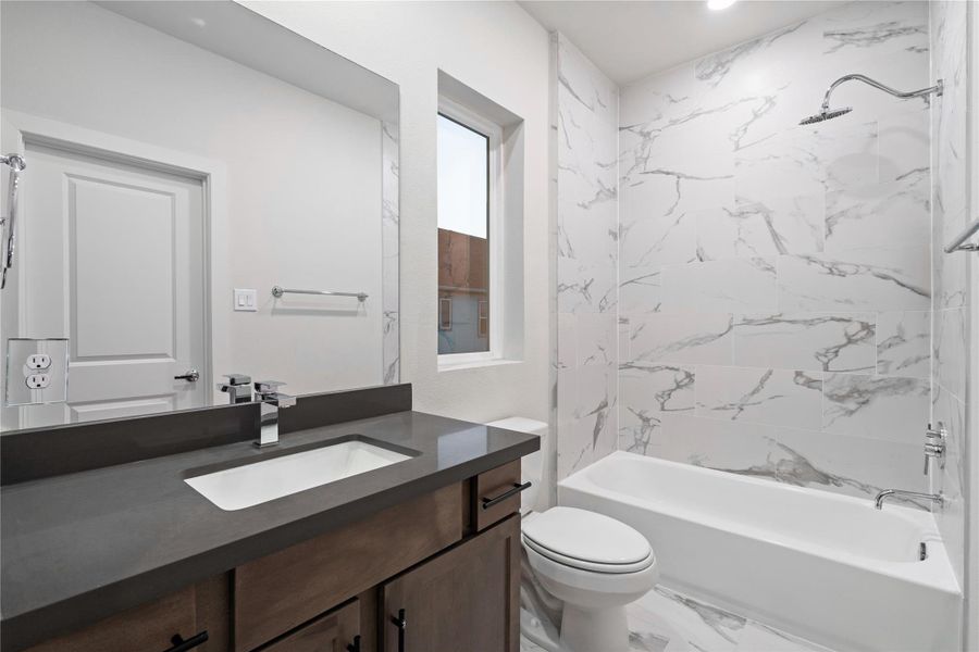 Alternate bathroom color palette displayed here reflects the selection options available, allowing buyers to choose a style that fits their preference.