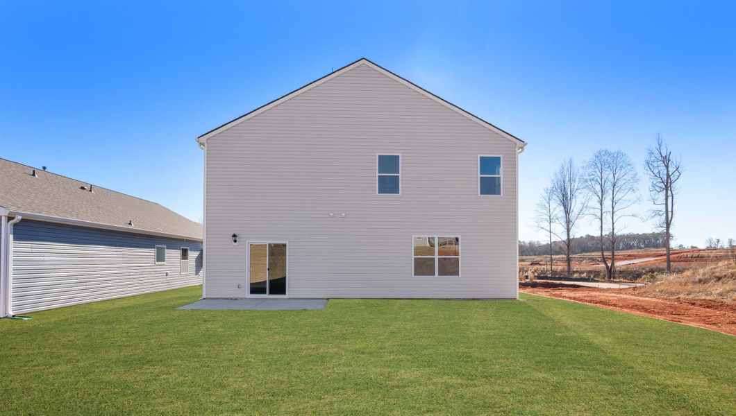 Front exterior of a new home in Brookside Farms, Greer, SC, highlighting curb appeal (Image 2).