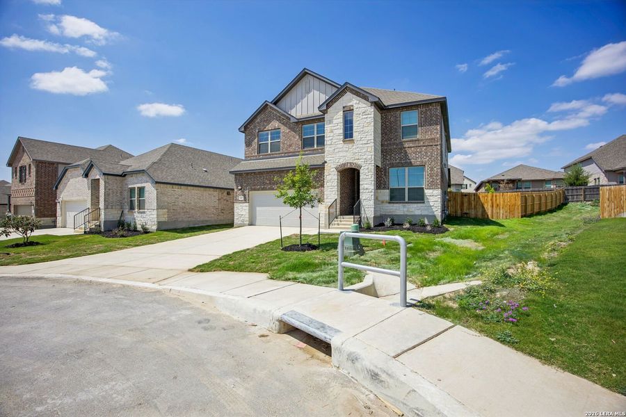 Front exterior of a new home in , San Antonio, TX, highlighting curb appeal (Image 30).