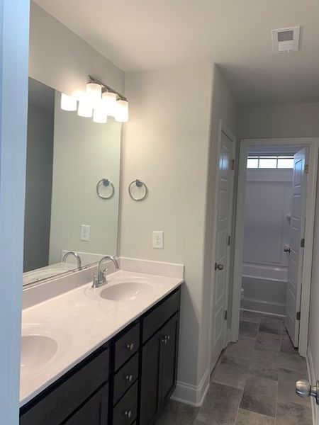 Furnished interior view inside a new home in Royal Pines, Trinity (Image 5).