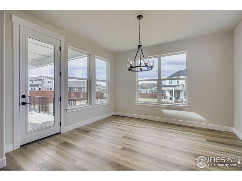 Spacious, unfurnished interior of a new home in RainDance National 60/70, Windsor (Image 18).