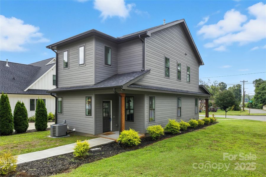 Front exterior of a new home in , Belmont, NC, highlighting curb appeal (Image 24). Front exterior of a new home in , Belmont, NC, highlighting curb appeal (Image 24).