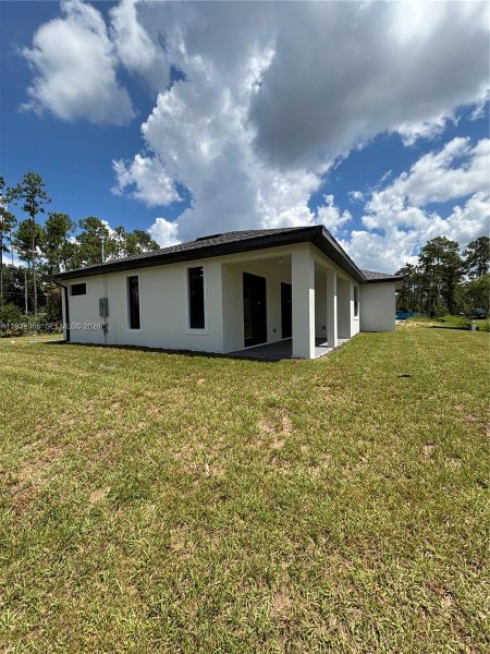 Exterior details and patio area of a home in , Lehigh Acres (Image 27).