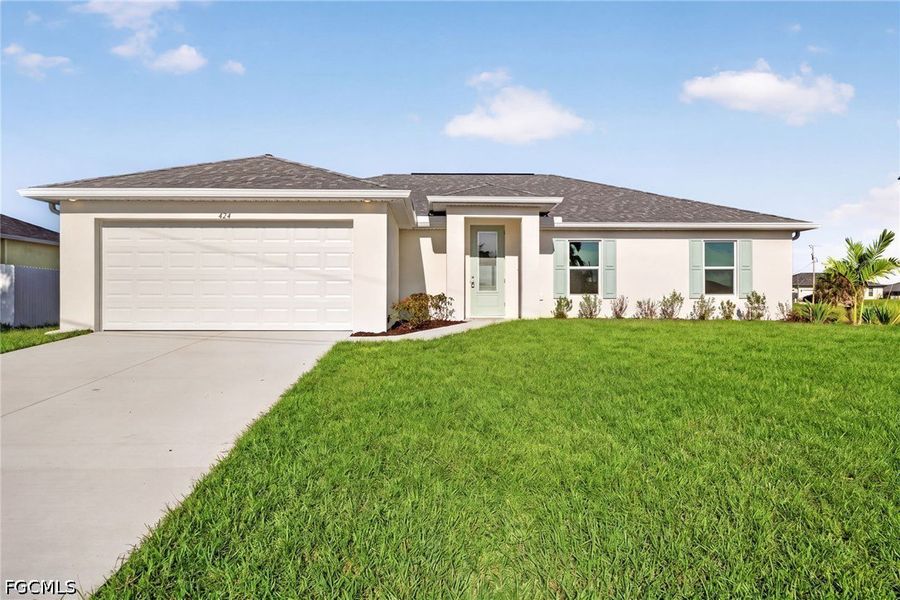 Front exterior of a new home in Cape Coral, Cape Coral, FL, highlighting curb appeal (Image 1). Front exterior of a new home in Cape Coral, Cape Coral, FL, highlighting curb appeal (Image 1).