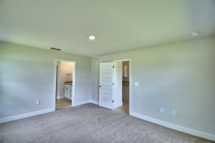 Spacious, unfurnished interior of a new home in Cadence Crossing, Auburndale (Image 34).