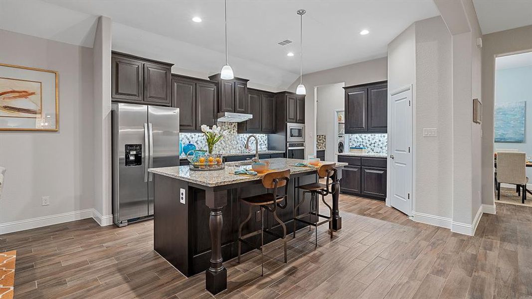 Kitchen - All Home and community information, including pricing, included features, terms, availability and amenities, are subject to change at any time without notice or obligation. All Drawings, pictures, photographs, video, square footages, floor plans, elevations, features, colors and sizes are approximate for illustration purposes only and will vary from the homes as built.