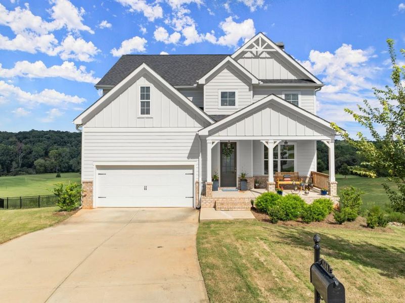 Front exterior of a new home in , Homer, GA, highlighting curb appeal (Image 1).