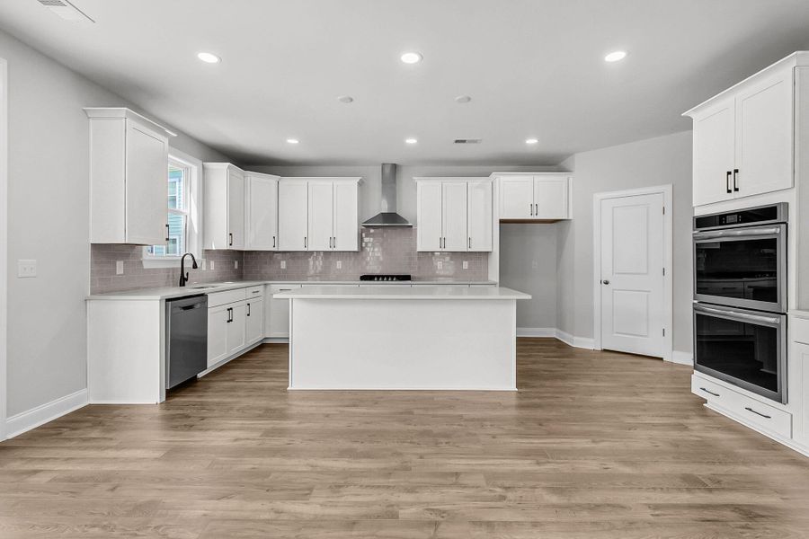 Furnished interior view inside a new home in Tidewater at Lakes of Cane Bay, Summerville (Image 14).