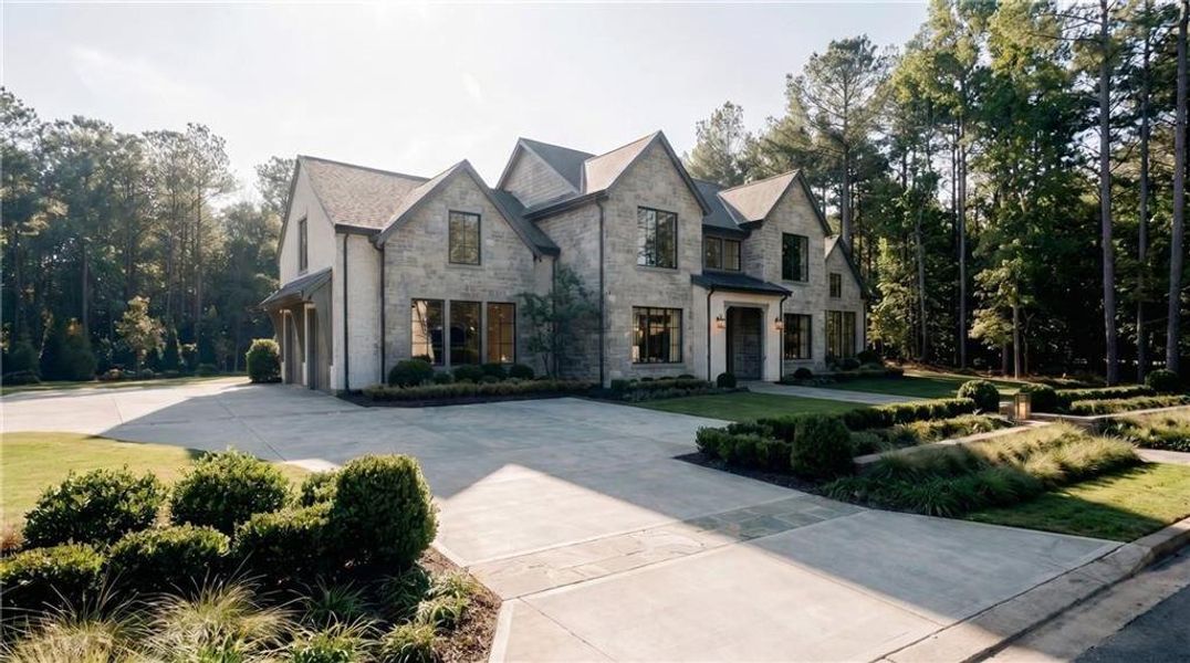Front exterior of a new home in , Douglasville, GA, highlighting curb appeal (Image 1). Front exterior of a new home in , Douglasville, GA, highlighting curb appeal (Image 1).