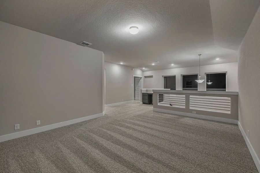 Representative unfurnished interior of a home built from the Jordy by Chesmar Homes in Stillwater Ranch, Buda (Image 21).