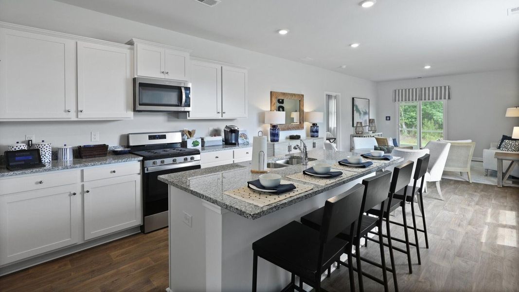 Furnished interior view inside a new home in Pine Hills at Cane Bay, Summerville (Image 19). Furnished interior view inside a new home in Pine Hills at Cane Bay, Summerville (Image 19).