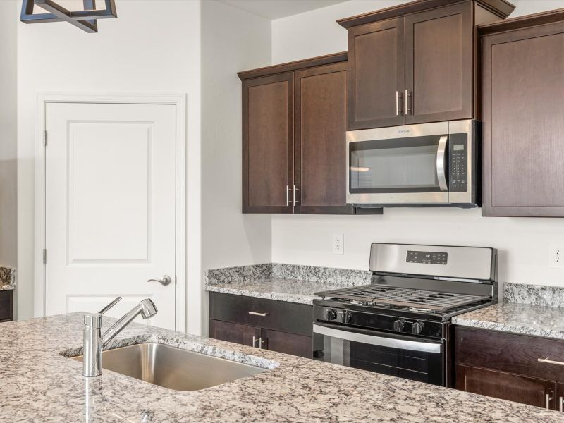 Furnished interior view inside a new home in Valencia Crossing, Tucson (Image 3). Furnished interior view inside a new home in Valencia Crossing, Tucson (Image 3).