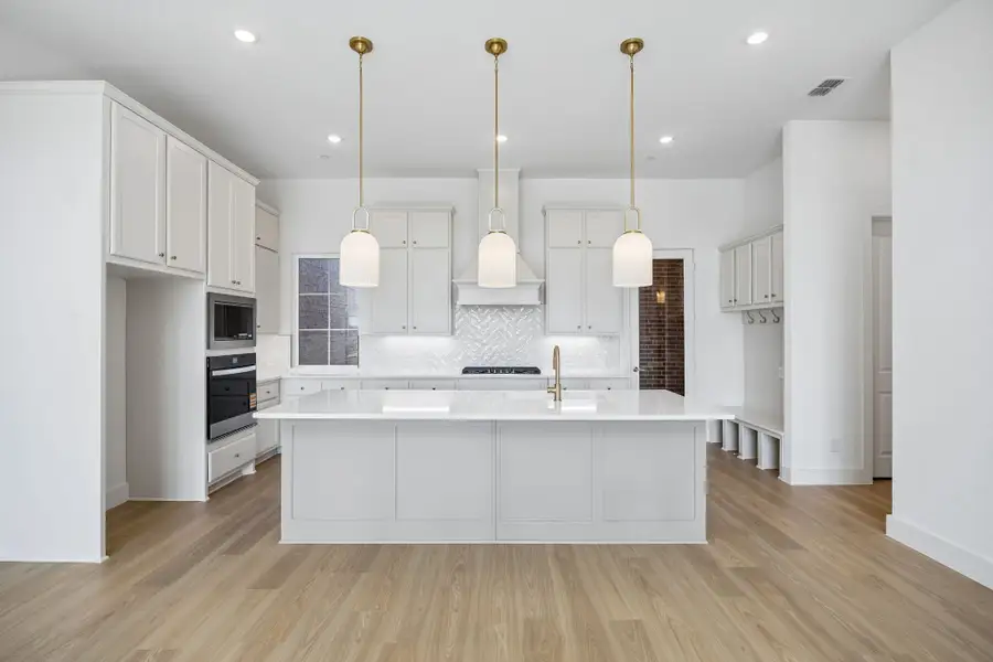 Furnished interior view inside a new home in Newman Village Townhomes, Frisco (Image 5).