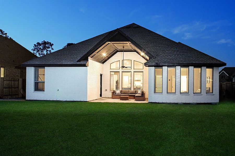 Exterior details and patio area of a home in The Meadows at Imperial Oaks, Conroe (Image 21).