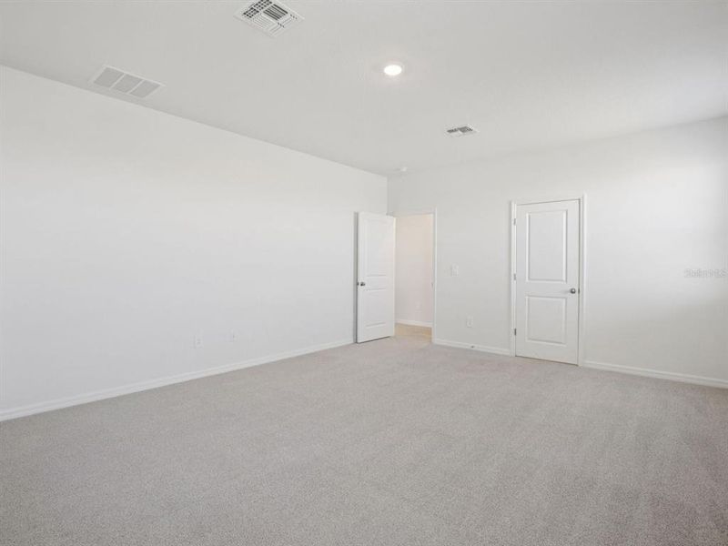 Spacious, unfurnished interior of a new home in Coasterra - Reserve Series, Palmetto (Image 15).