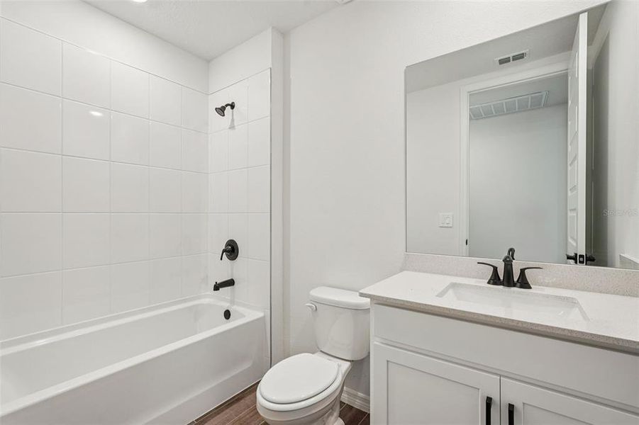 Furnished interior view inside a new home in Oakfield Trails - Signature Series, Parrish (Image 6).