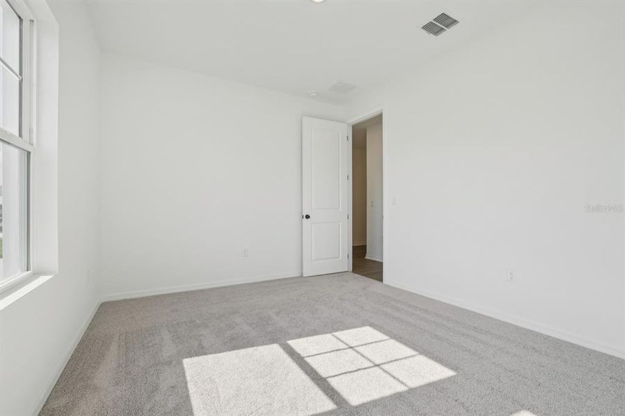 Spacious, unfurnished interior of a new home in Tyson Reserve, St. Cloud (Image 30).