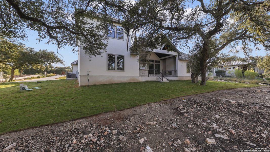 Front exterior of a new home in , New Braunfels, TX, highlighting curb appeal (Image 26).