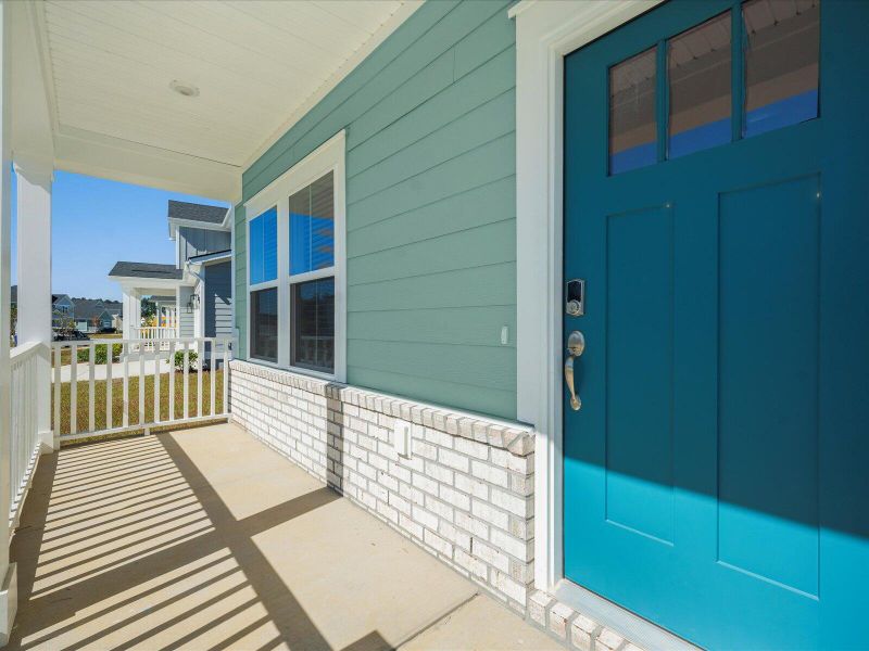 Exterior details and patio area of a home in The Coves at Lakes of Cane Bay, Summerville (Image 4). Exterior details and patio area of a home in The Coves at Lakes of Cane Bay, Summerville (Image 4).